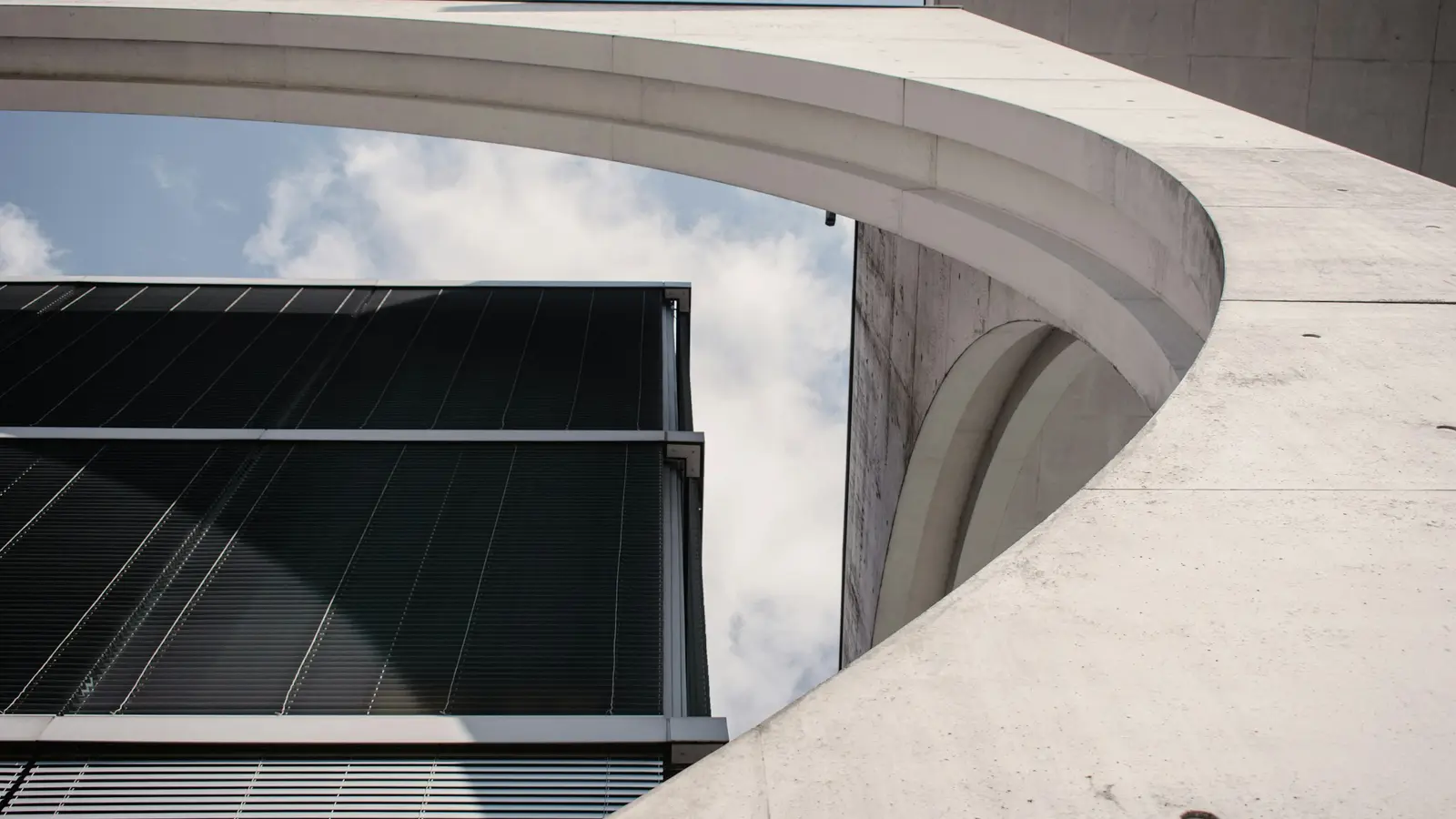 Modern building facade with large glass panels and clean sightlines