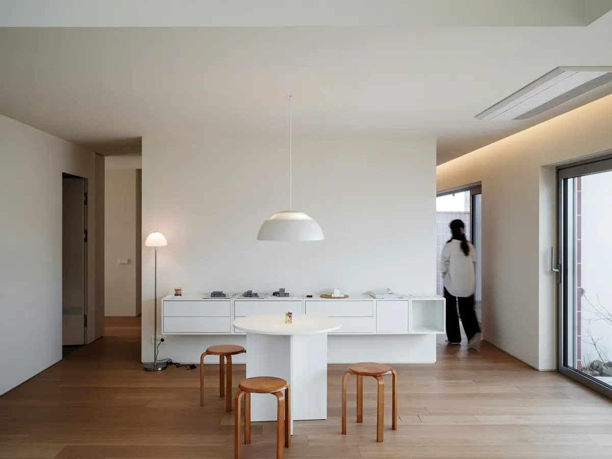 Minimal interior with natural light through a large window