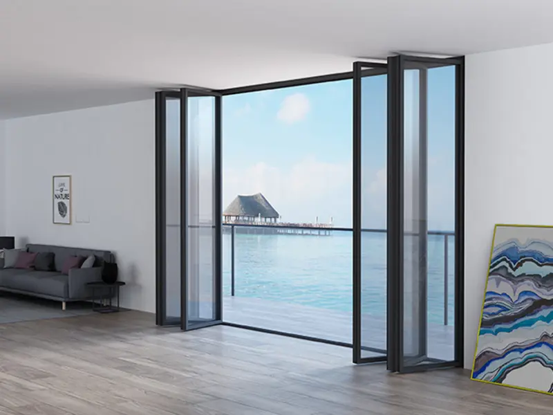 Aluminium folding door system opened onto a waterfront view