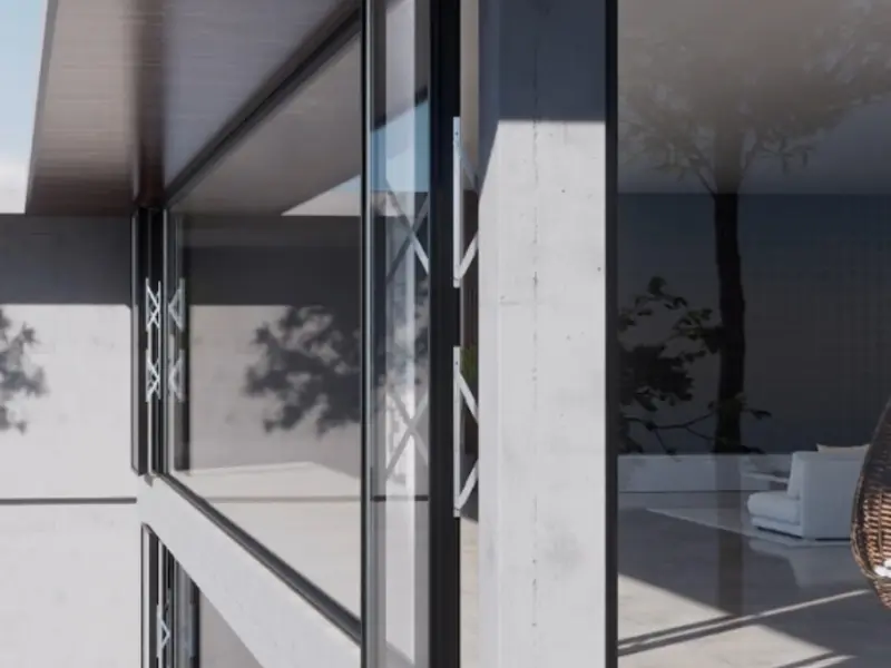Parallel-opening window angled open on a concrete building exterior