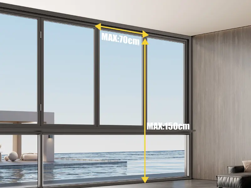 Aluminium folding window open above an oceanview terrace