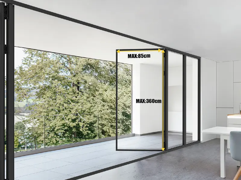 Aluminium folding door opened onto a balcony with a coastal mountain view